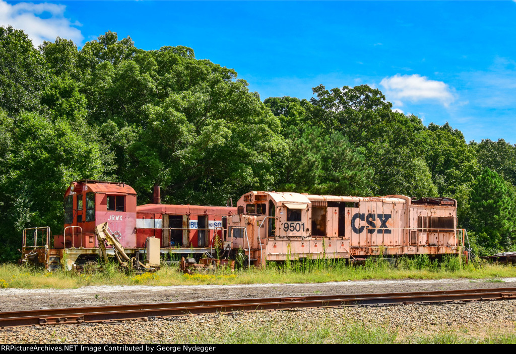 PICK 9501 & JRWX 115 used for parts sitting @ the yard of Pickens railways